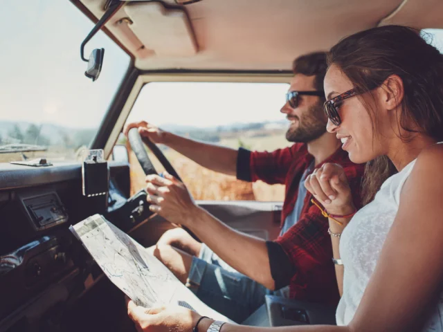 Couple on a road trip in a van